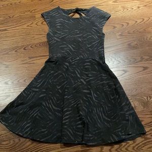 Aritzia Talula open back skater dress.